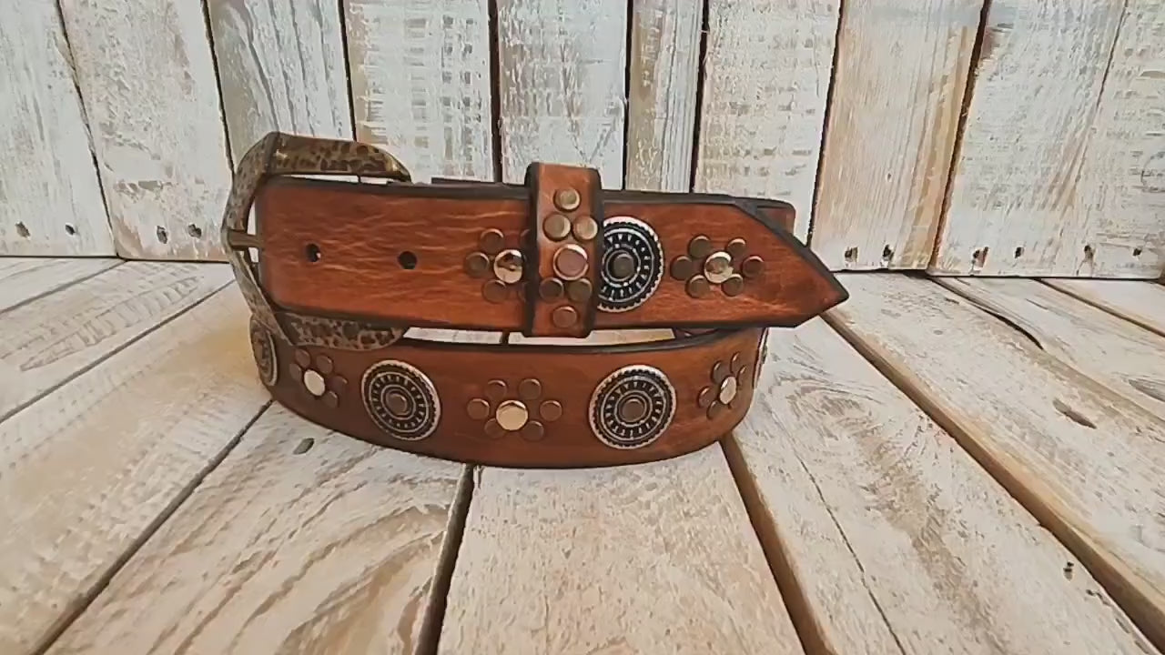 handcrafted brown leather belt with ishaor's unique design: light brown belt with gold and silver rivets and silver coin accents