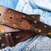 brown leather belt for guitarists two tone design pick storage and bronze studs brown leather belt for guitarists two tone design pick storage and bronze studs
