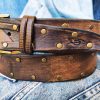 brown leather belt for guitarists two tone design pick storage and bronze studs brown leather belt for guitarists two tone design pick storage and bronze studs
