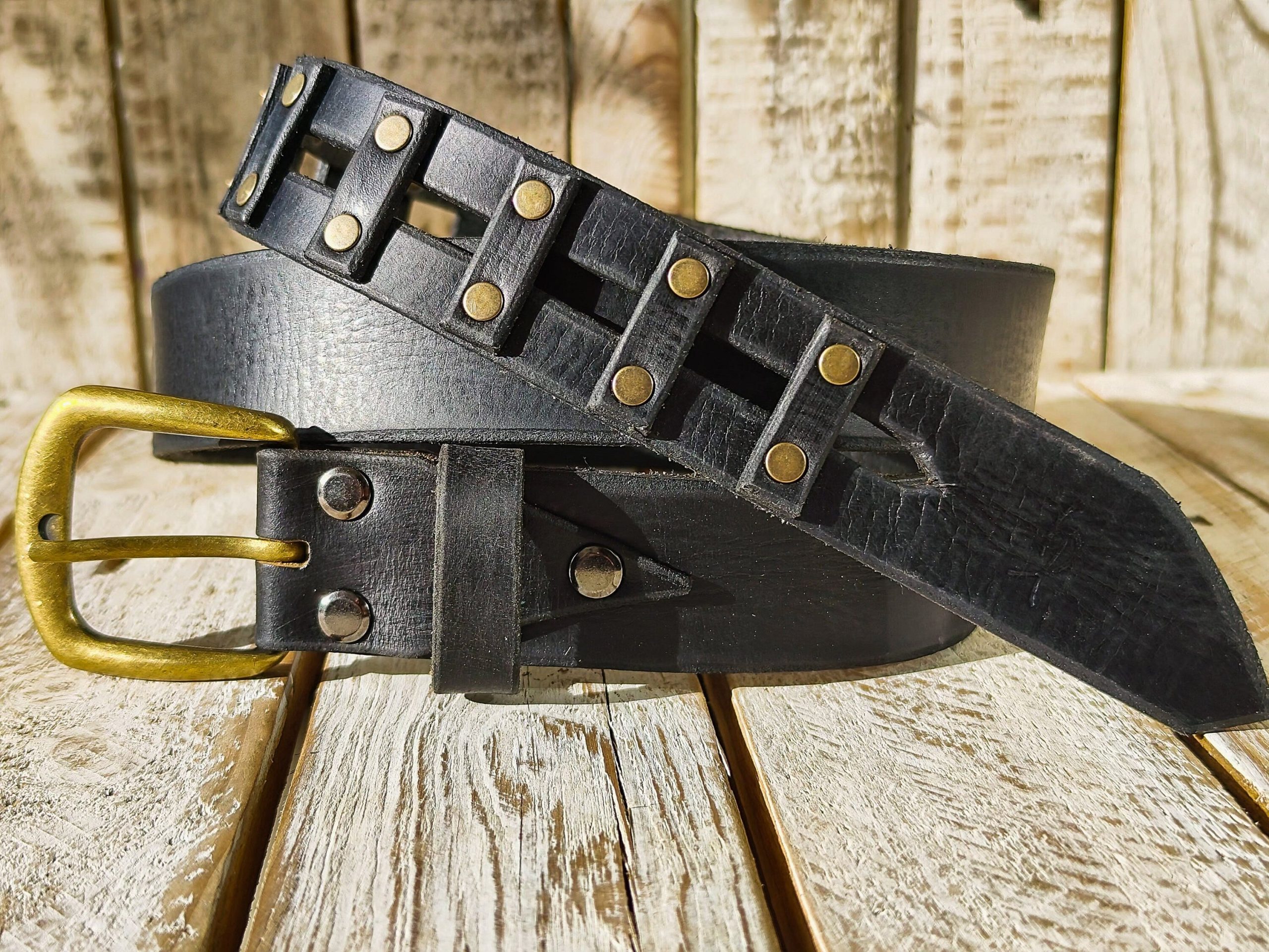 handcrafted original black leather studded belt (3.6cm width) with bronze buckle handcrafted original black leather studded belt (3.6cm width) with bronze buckle