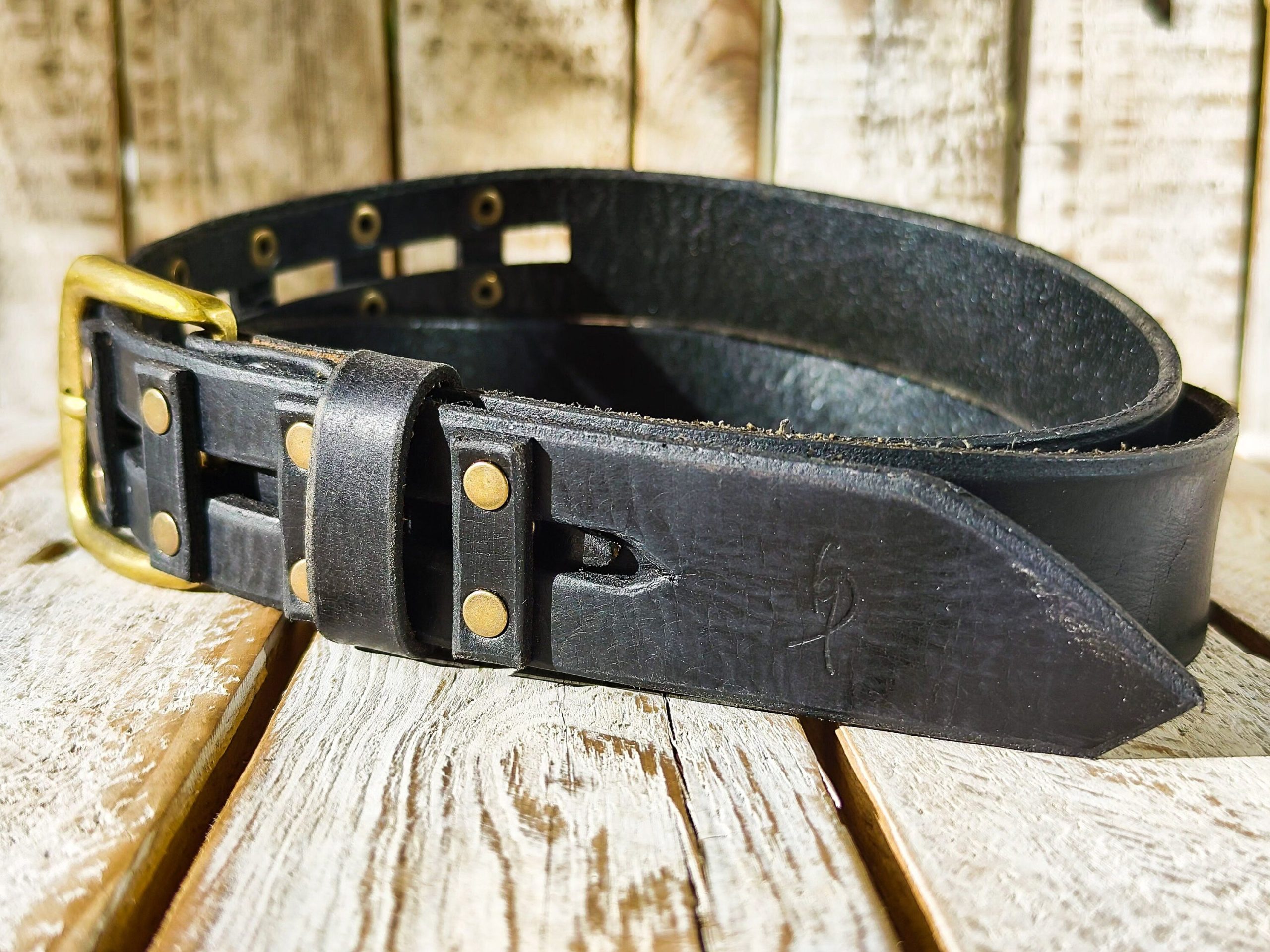 handcrafted original black leather studded belt (3.6cm width) with bronze buckle handcrafted original black leather studded belt (3.6cm width) with bronze buckle