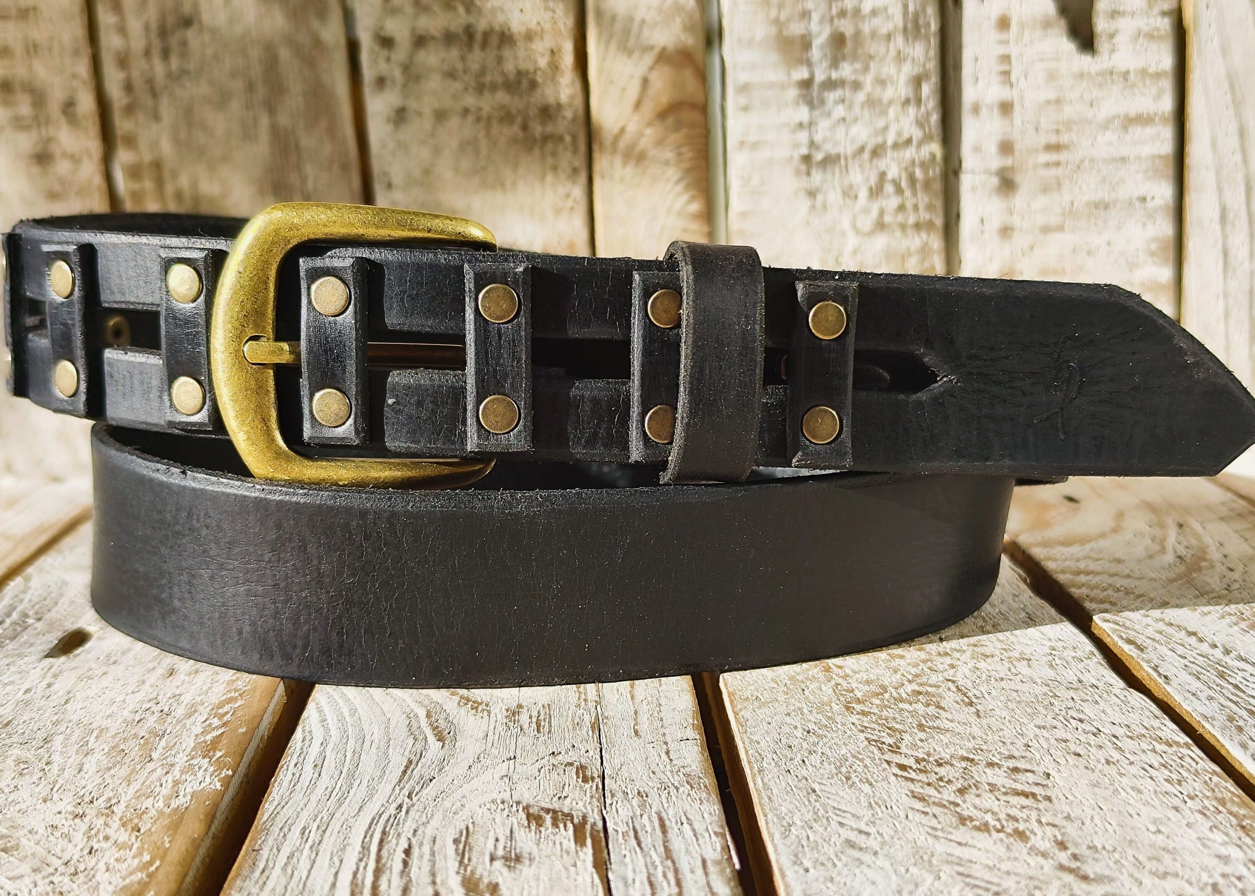 handcrafted original black leather studded belt (3.6cm width) with bronze buckle handcrafted original black leather studded belt (3.6cm width) with bronze buckle