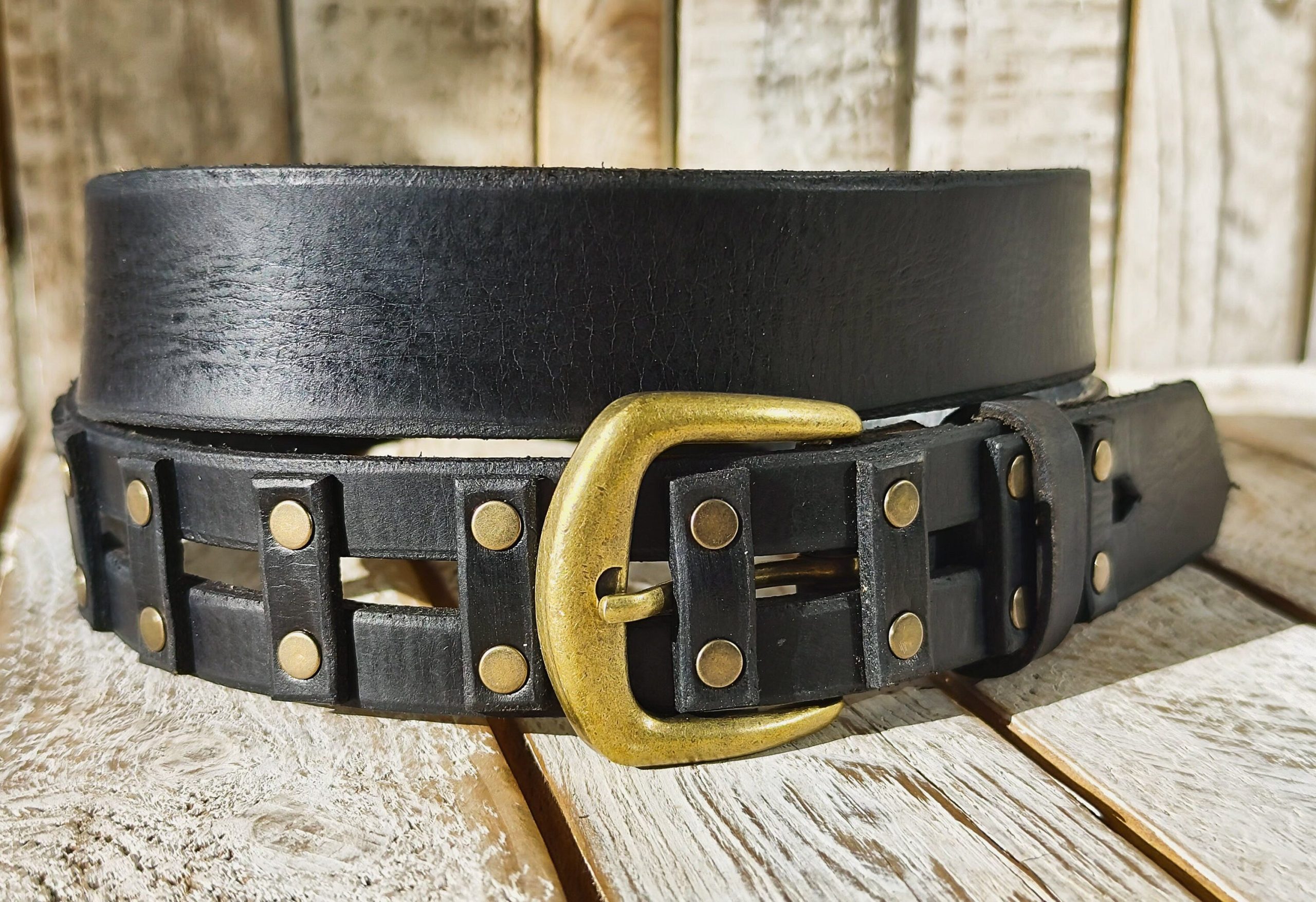 handcrafted original black leather studded belt (3.6cm width) with bronze buckle handcrafted original black leather studded belt (3.6cm width) with bronze buckle