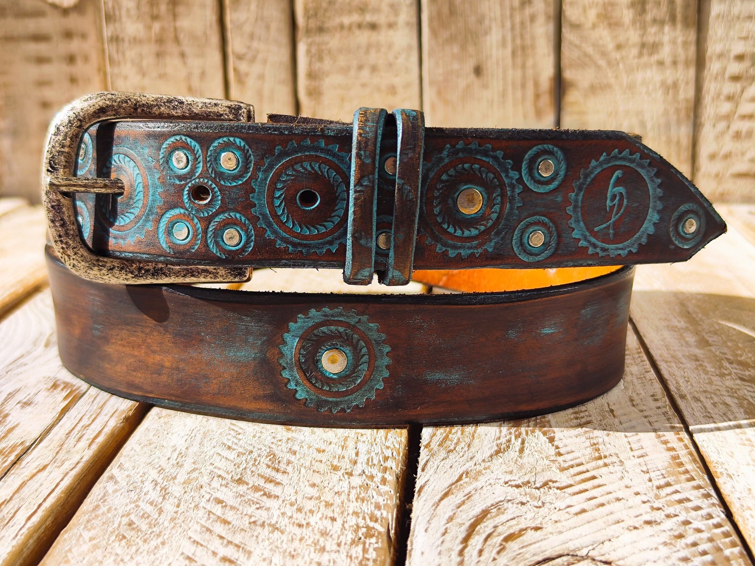 handmade brown leather belt with turquoise motorcycle gear design