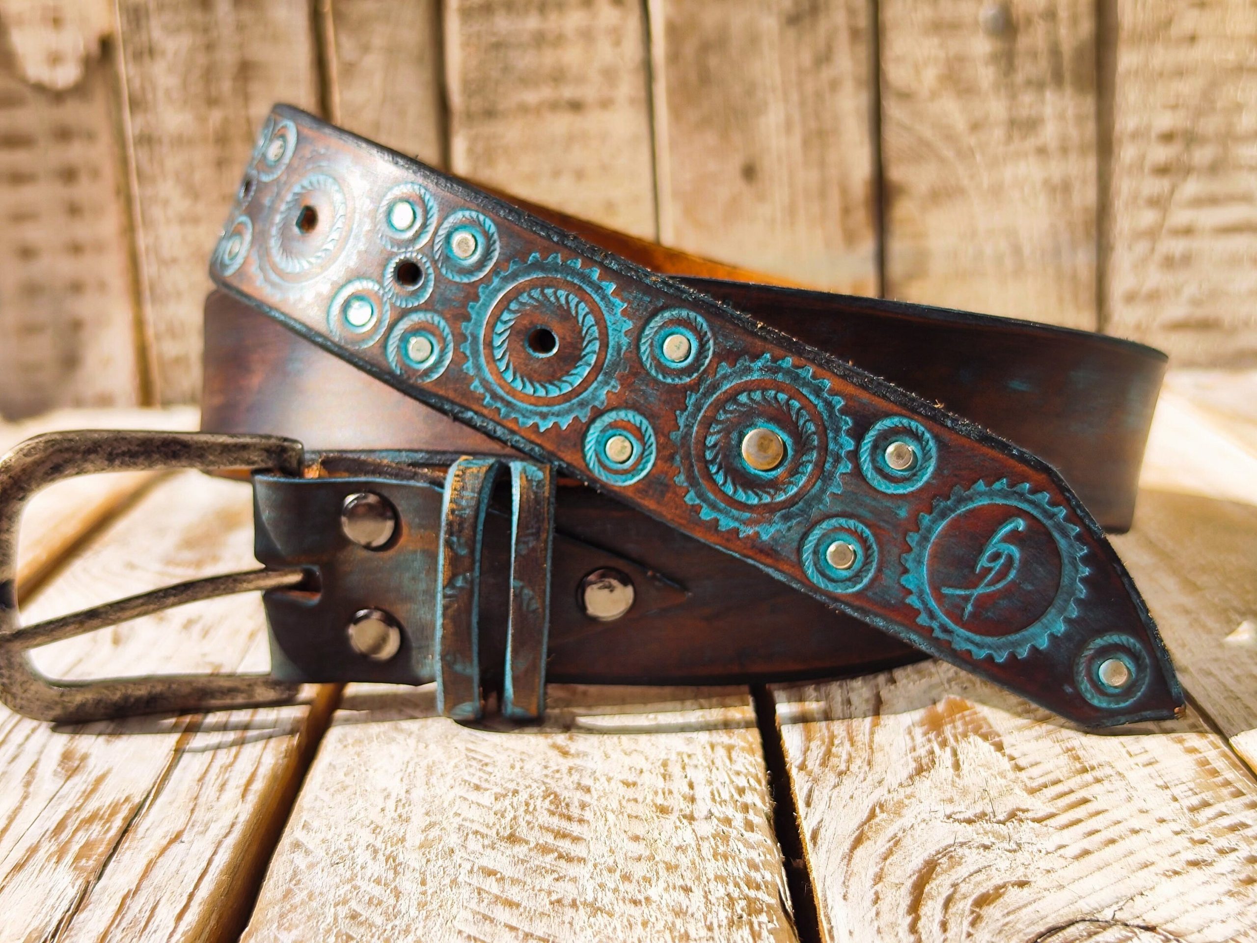 handmade brown leather belt with turquoise motorcycle gear design