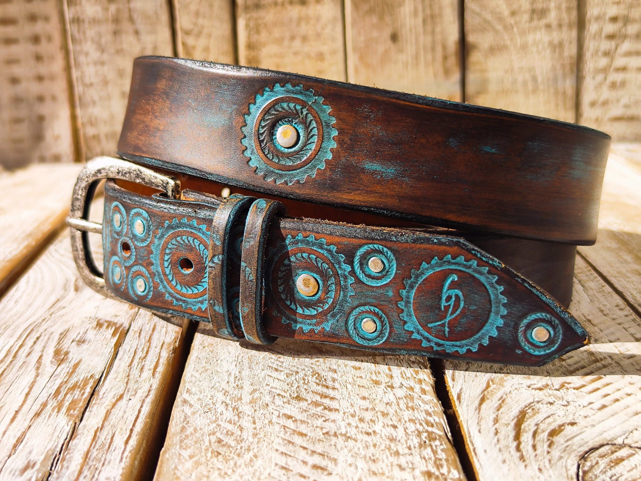 handmade brown leather belt with turquoise motorcycle gear design