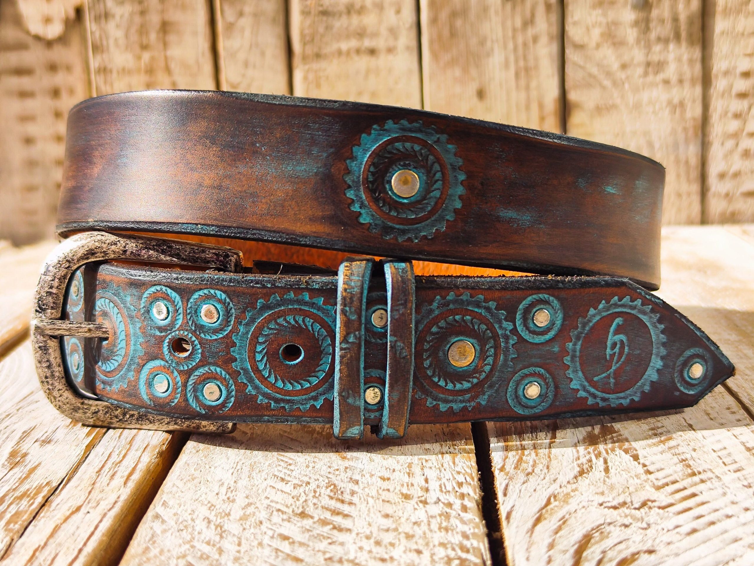 handmade brown leather belt with turquoise motorcycle gear design